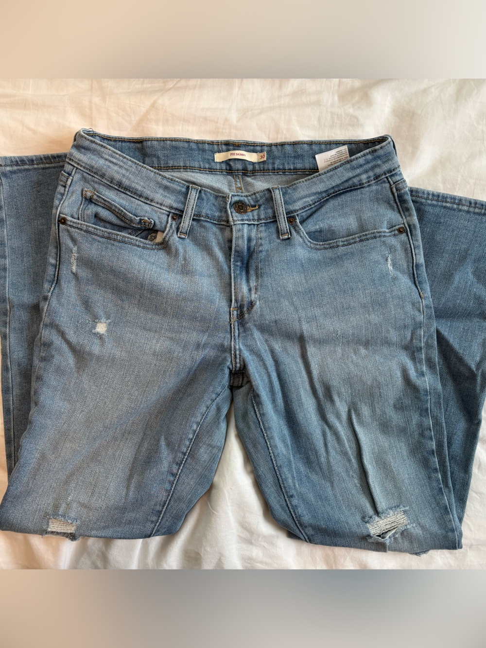 Levi 711 Distressed Skinny Jeans